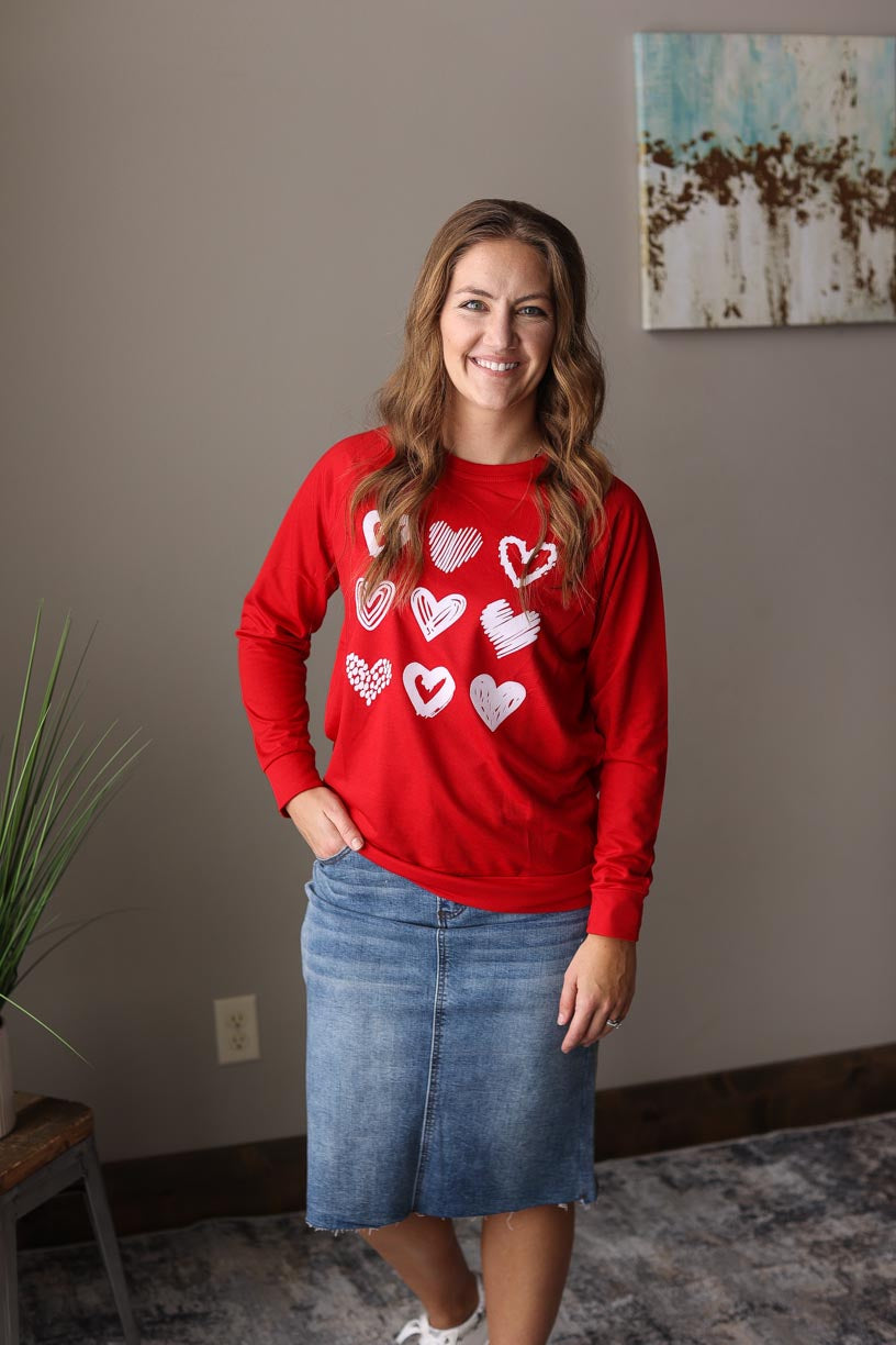 Red Hearts Print Crew Sweatshirt for Valentine's Day, Heart Graphic Casual Top at Classy Closet Boutique Near Me